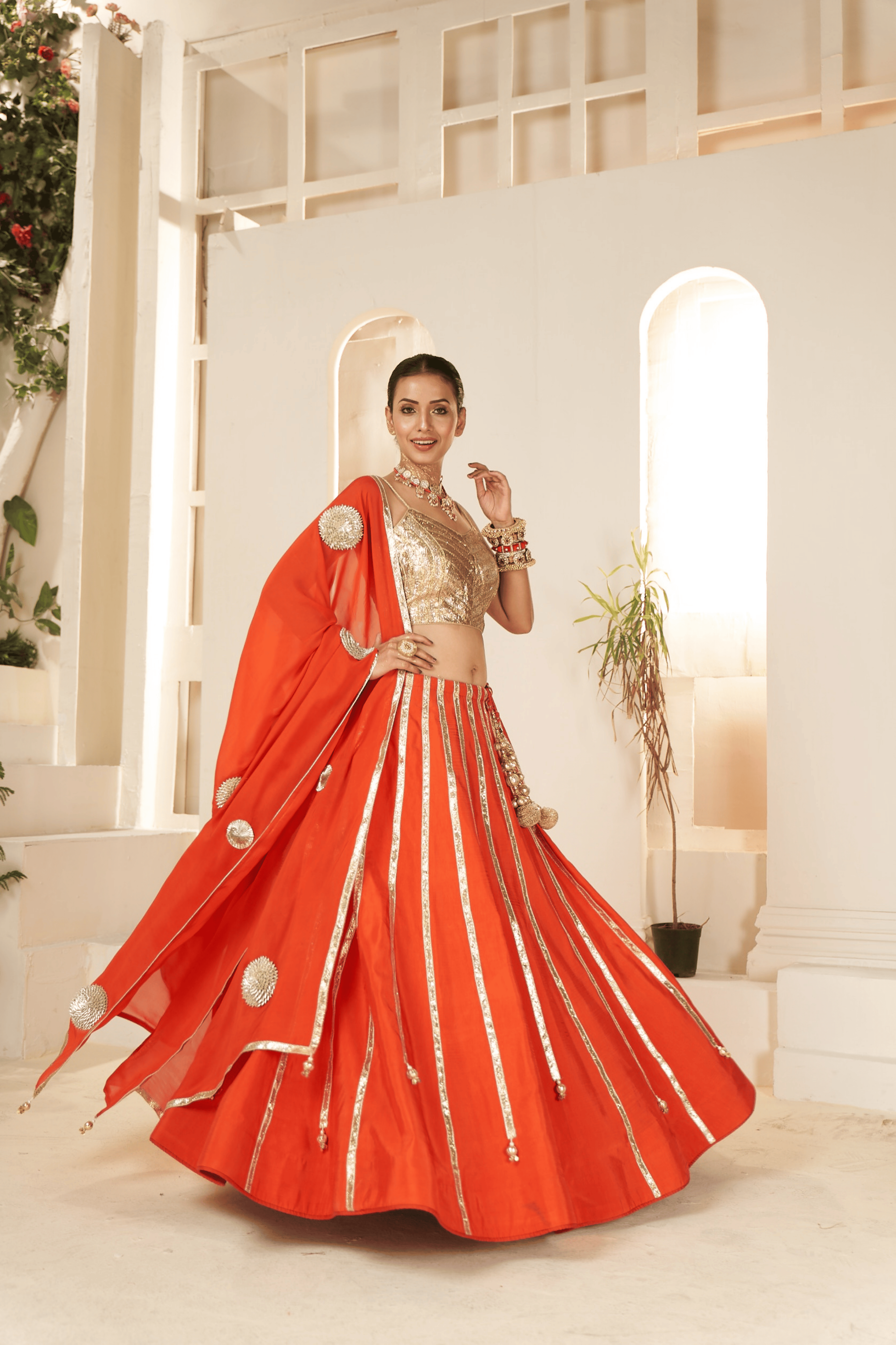 Adya - Burnt Orange Lehenga Set with Gota Patti Detailing