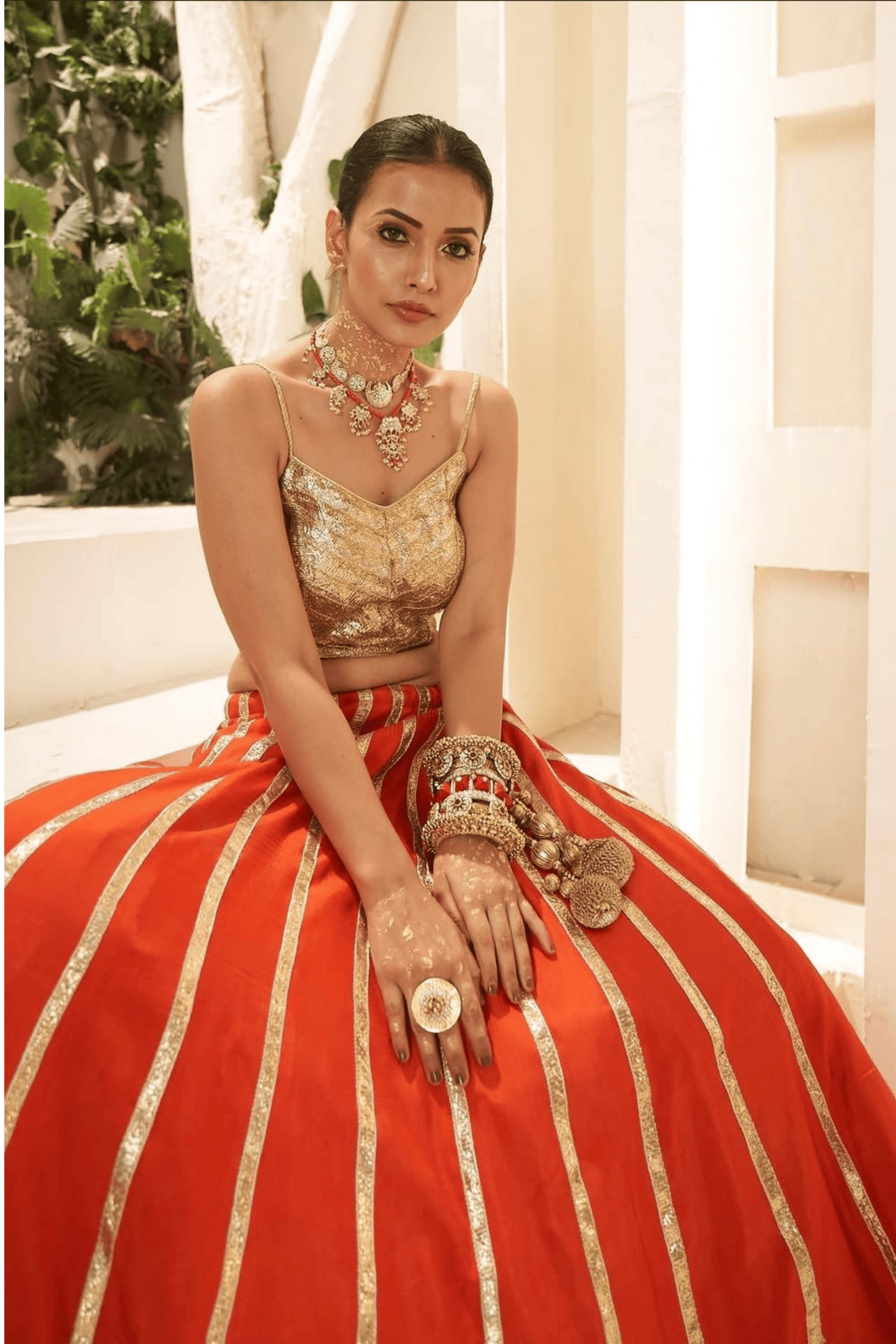Adya - Burnt Orange Lehenga Set with Gota Patti Detailing