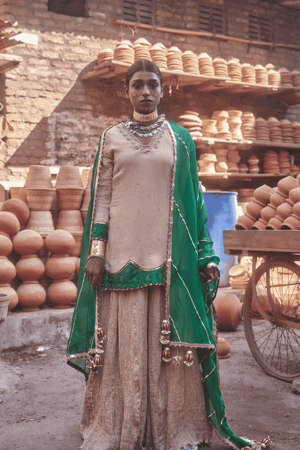 Zubaida- Light Gold Palazzo Set with Green Hand Embroidered Ikat Scallops