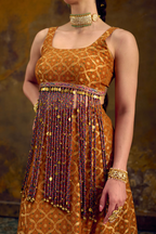 Naad Agni- Mustard Lehenga with Tassle Detailing