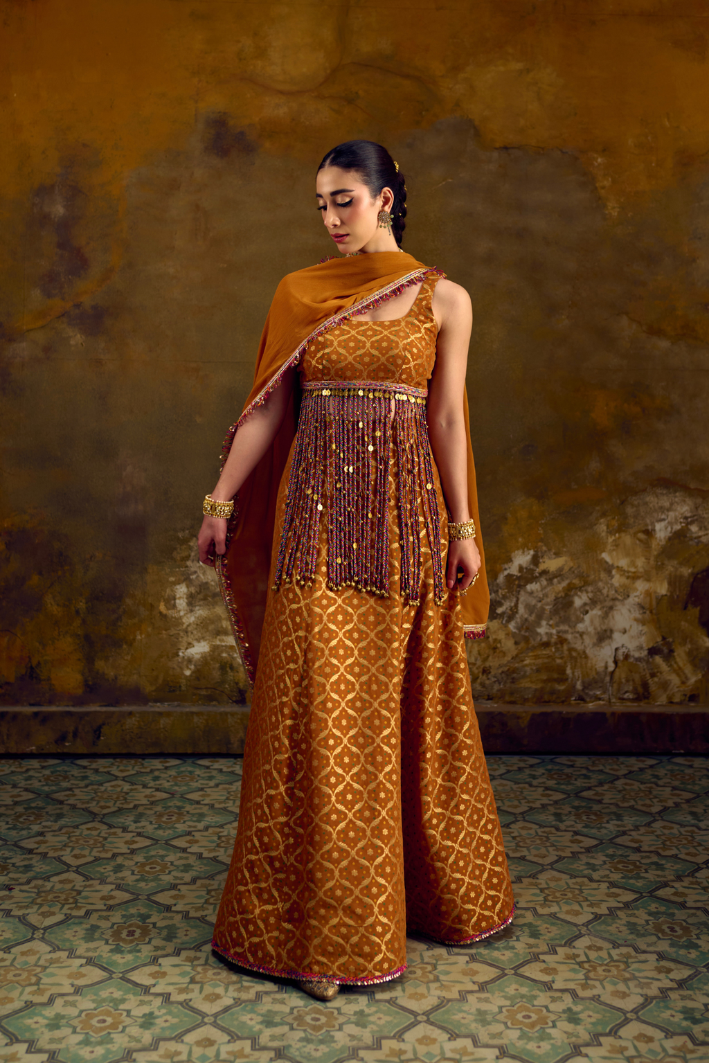 Naad Agni- Mustard Lehenga with Tassle Detailing