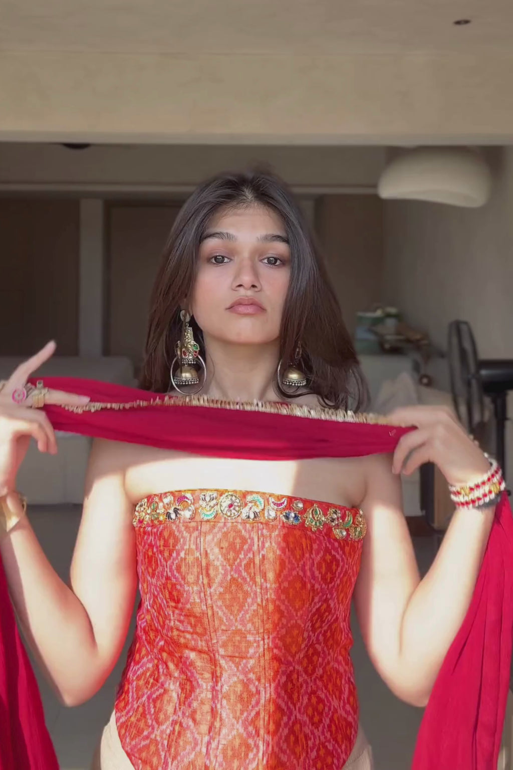 Ruhani - Rose Gold Fishcut Lehenga Set with Orange Hand Embroidered Ikat Corset